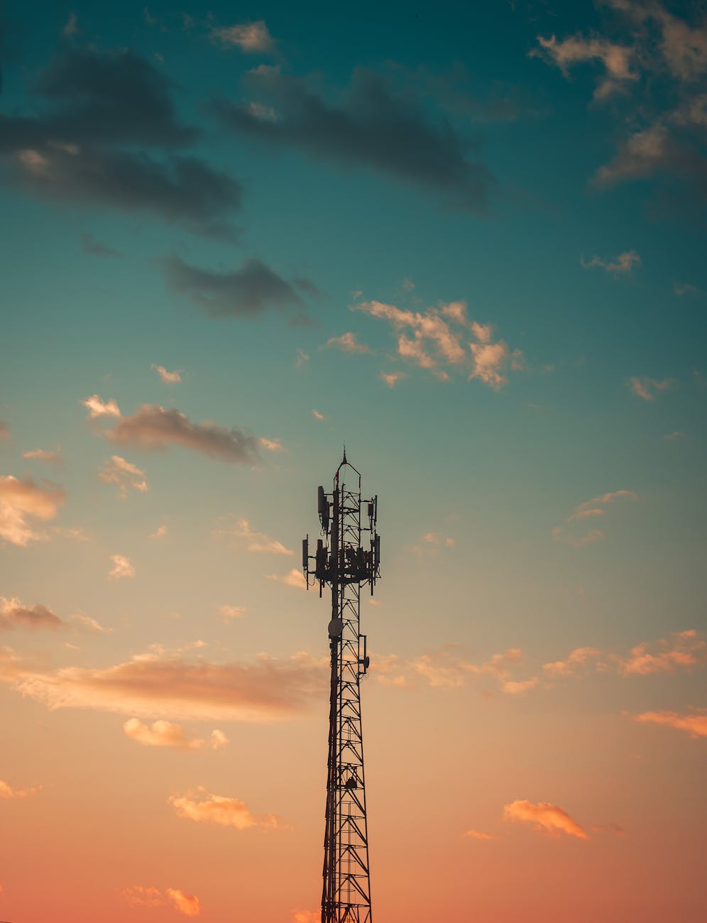 silhouette photography of steel tower