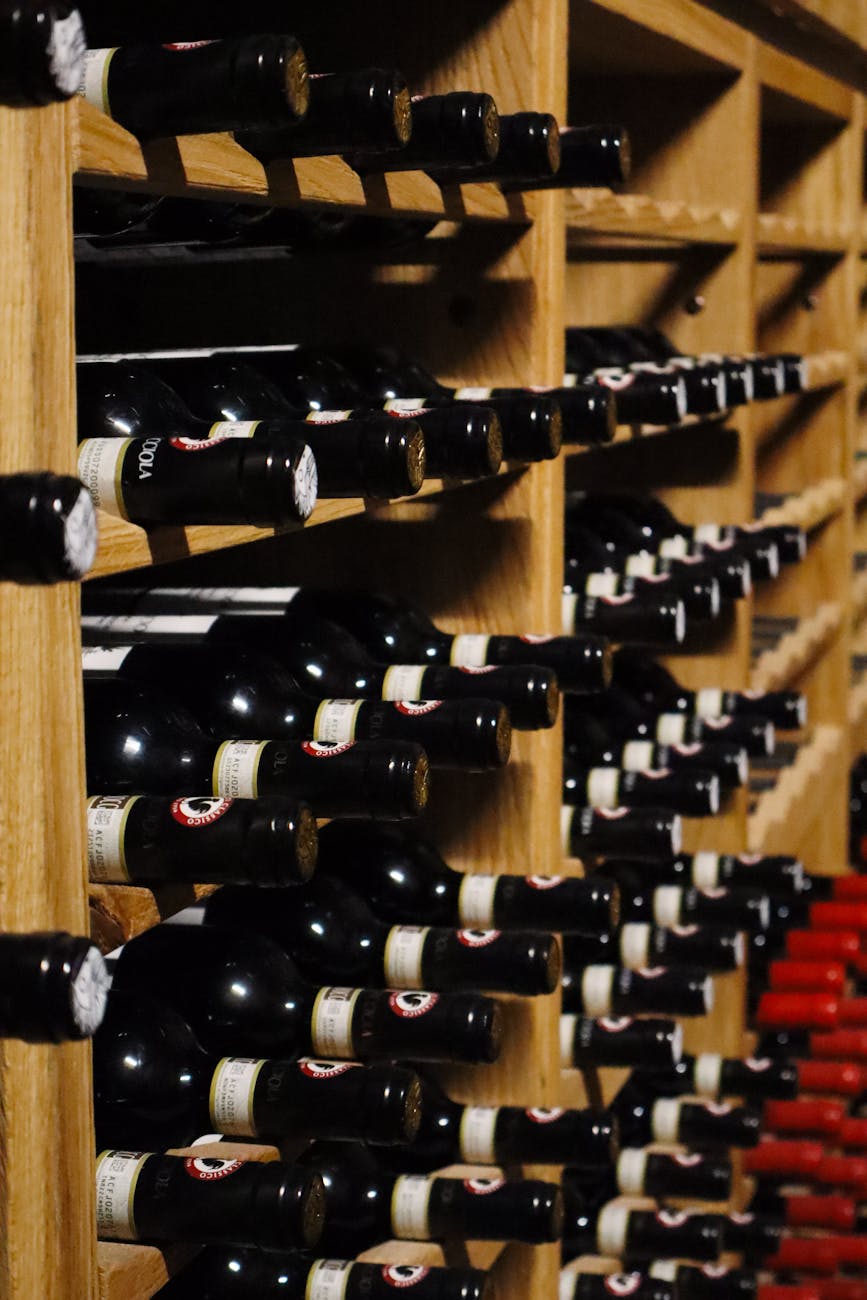 wine bottles neatly stored in wooden rack