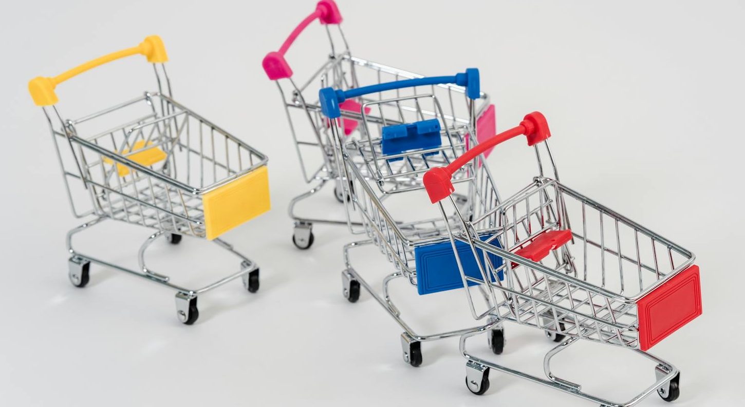 close up photo of mini push carts with different colors