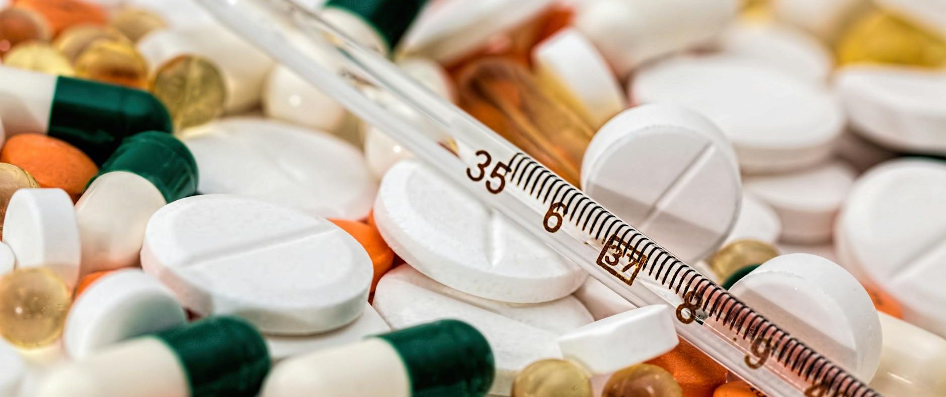thermometer on medical pills
