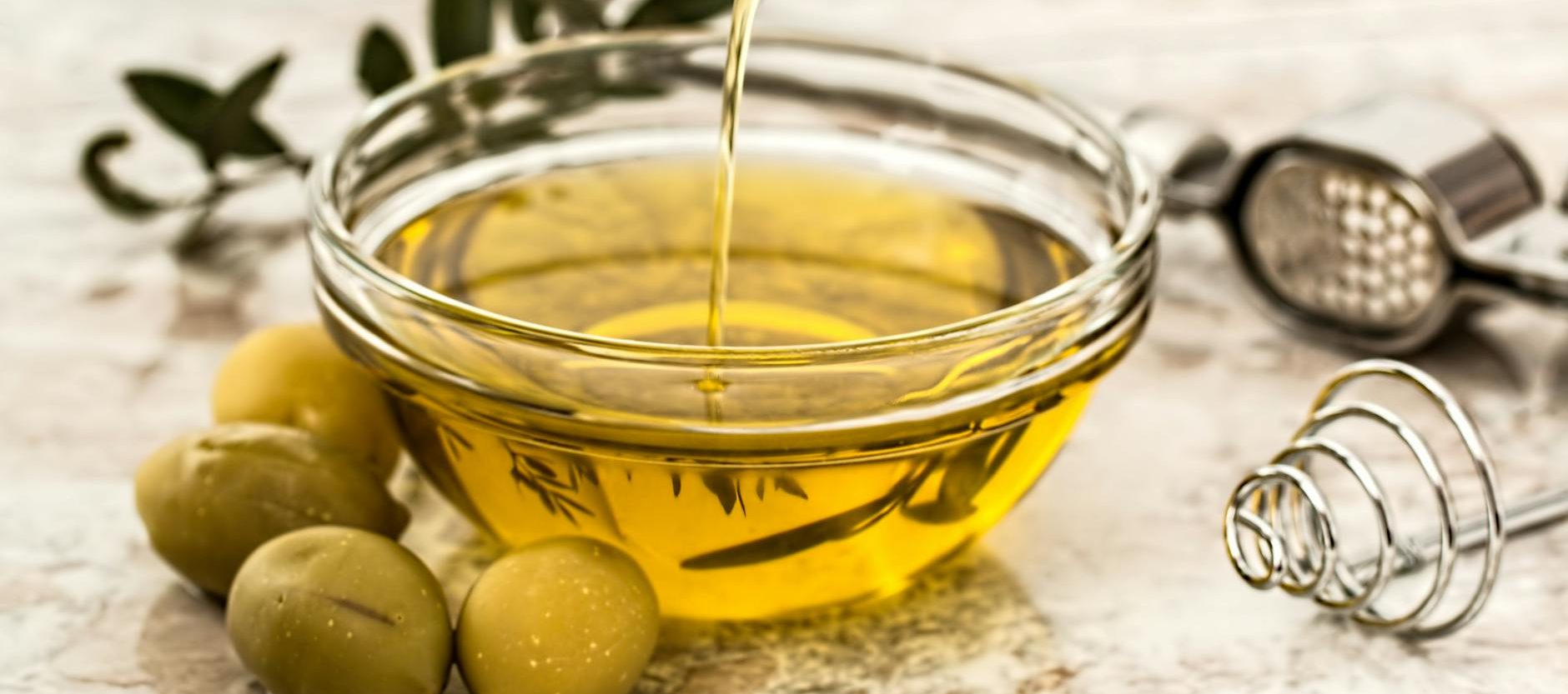 bowl being poured with yellow liquid