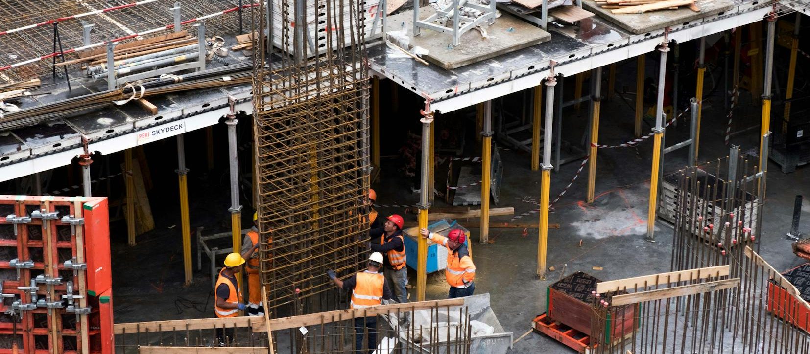 construction workers erecting a steel frame
