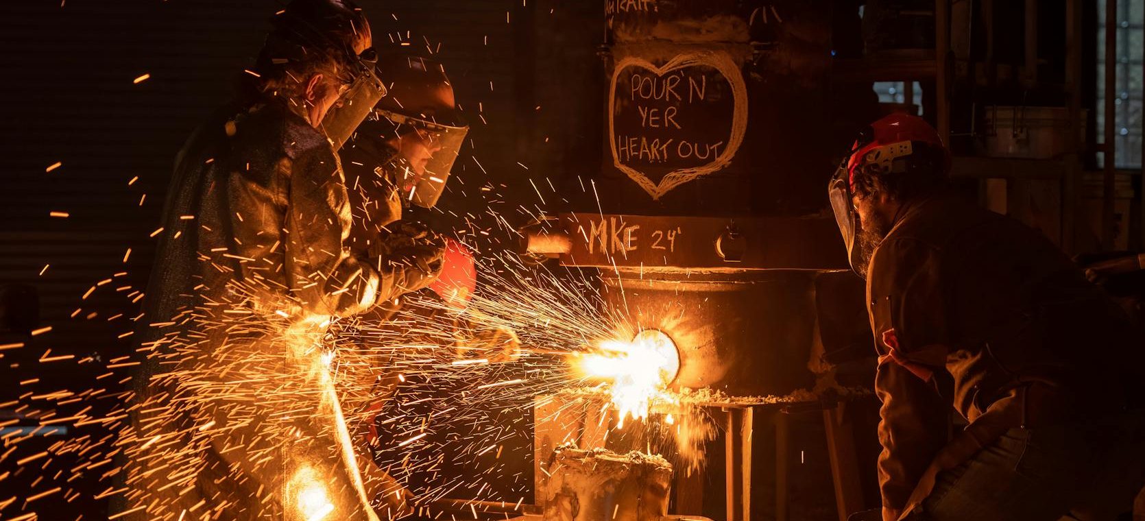 industrial workers molten metal pouring in milwaukee