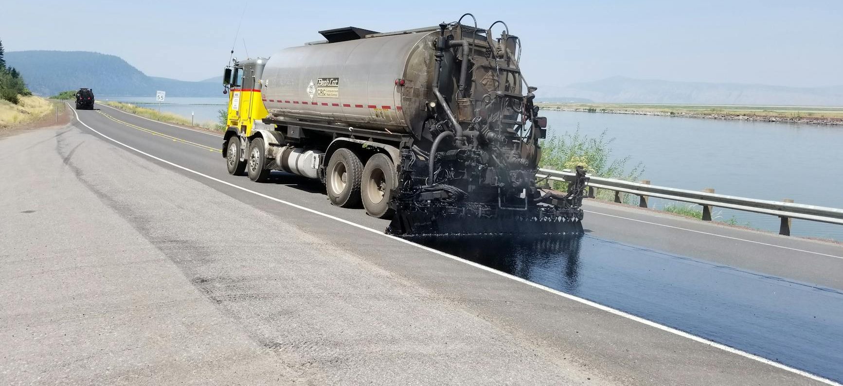 water truck cleaning the street