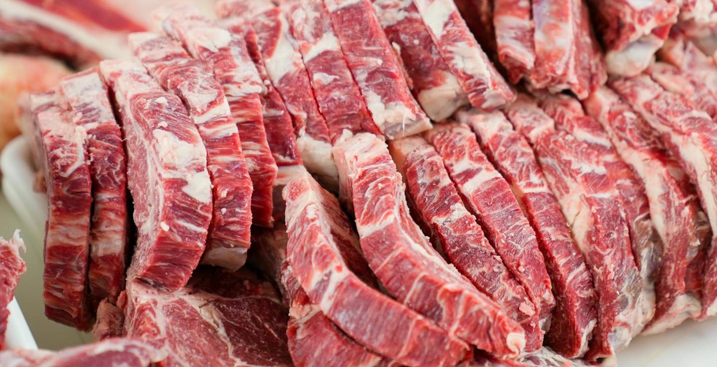 sliced meat on white tray