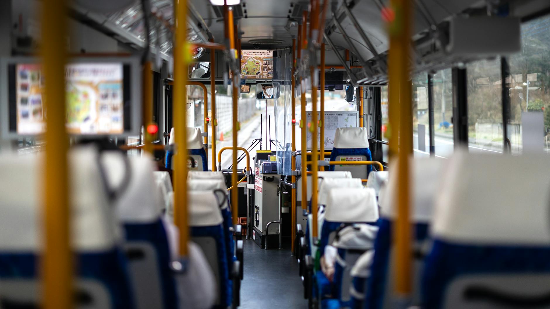 empty bus interior in japan with bright seats