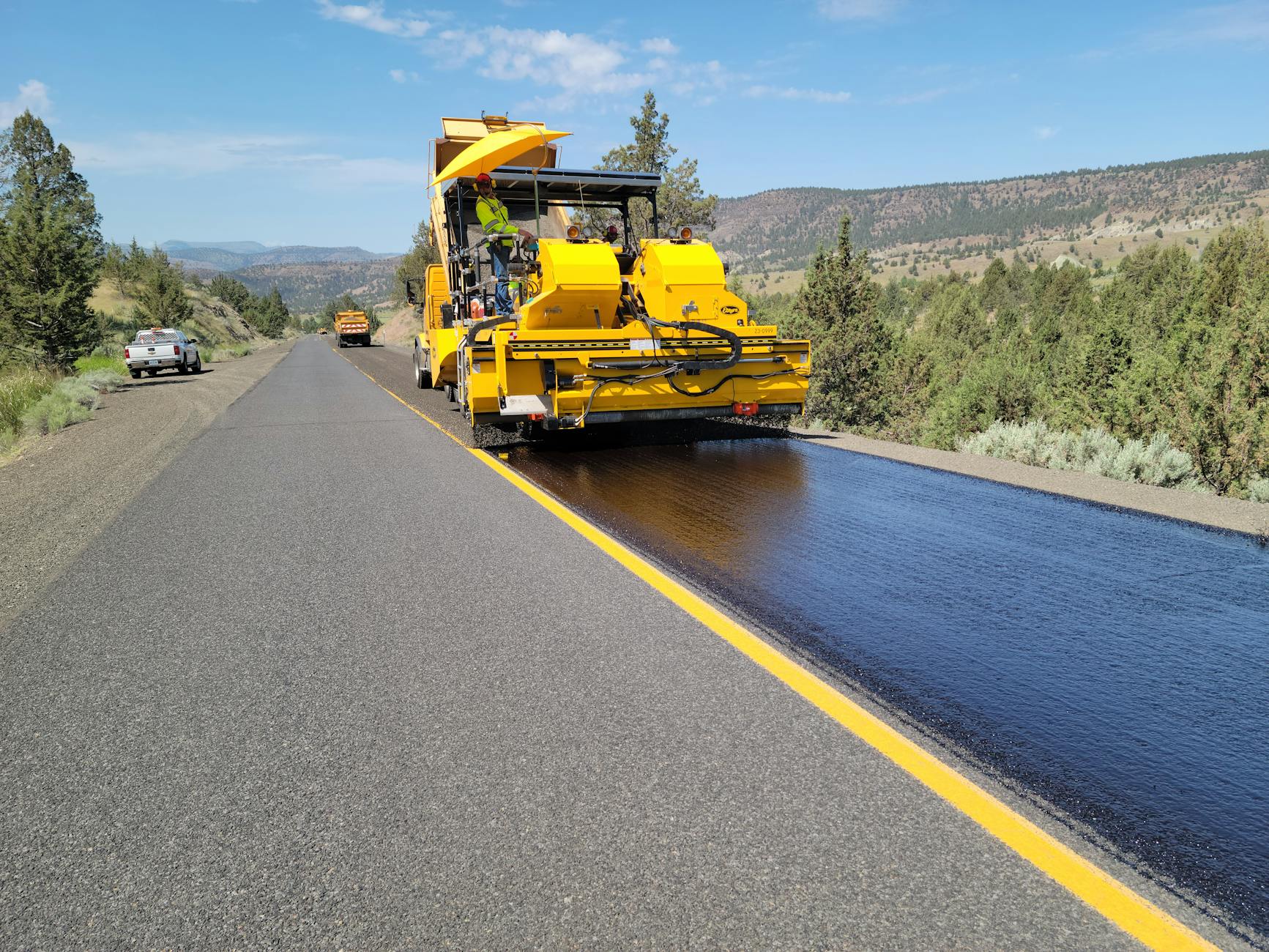 road paving in rural oregon landscape
